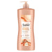 SUAVE KERATIN INFUSION SMOOTHING CONDITIONER- Smoothing conditioner for sleek and frizz-free hair.